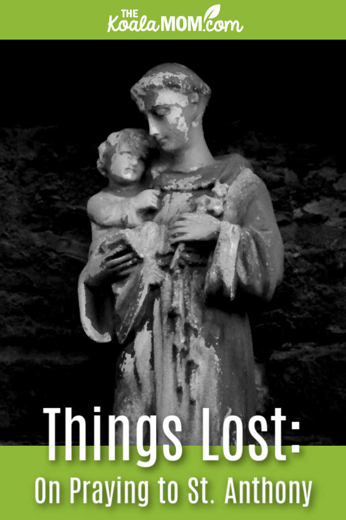 Things Lost: On Praying to St. Anthony. Black and white photo of worn St. Anthony statue by Budget Bizar via Pexels.