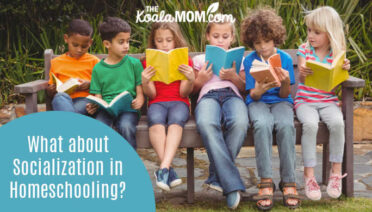 What about Socialization in Homeschooling Families? Photo of several kids reading together on a bench via Depositphotos.
