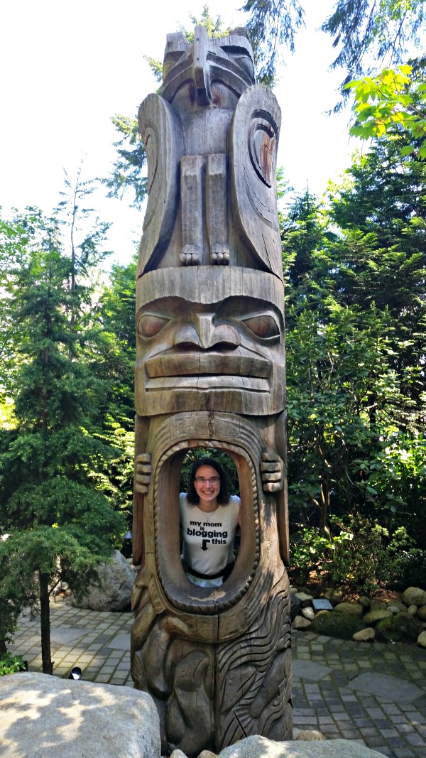 Bonnie in totem pole at the Capilano Suspension Bridge Park