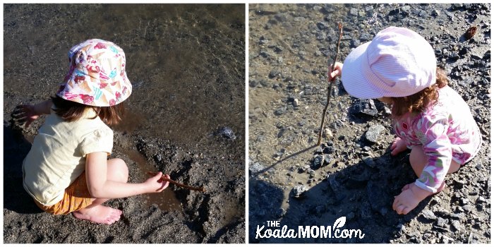 Two toddlers playing at the Buntzen Lake Beach