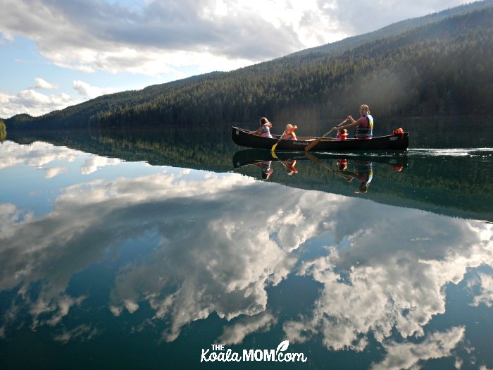 Bonnie and her daughters in a canoe on Clearwater Lake