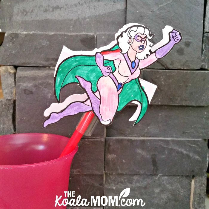 Superwoman drinking straw