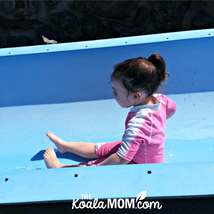 Toddler rides a slide at the Cultus Lake Waterpark.