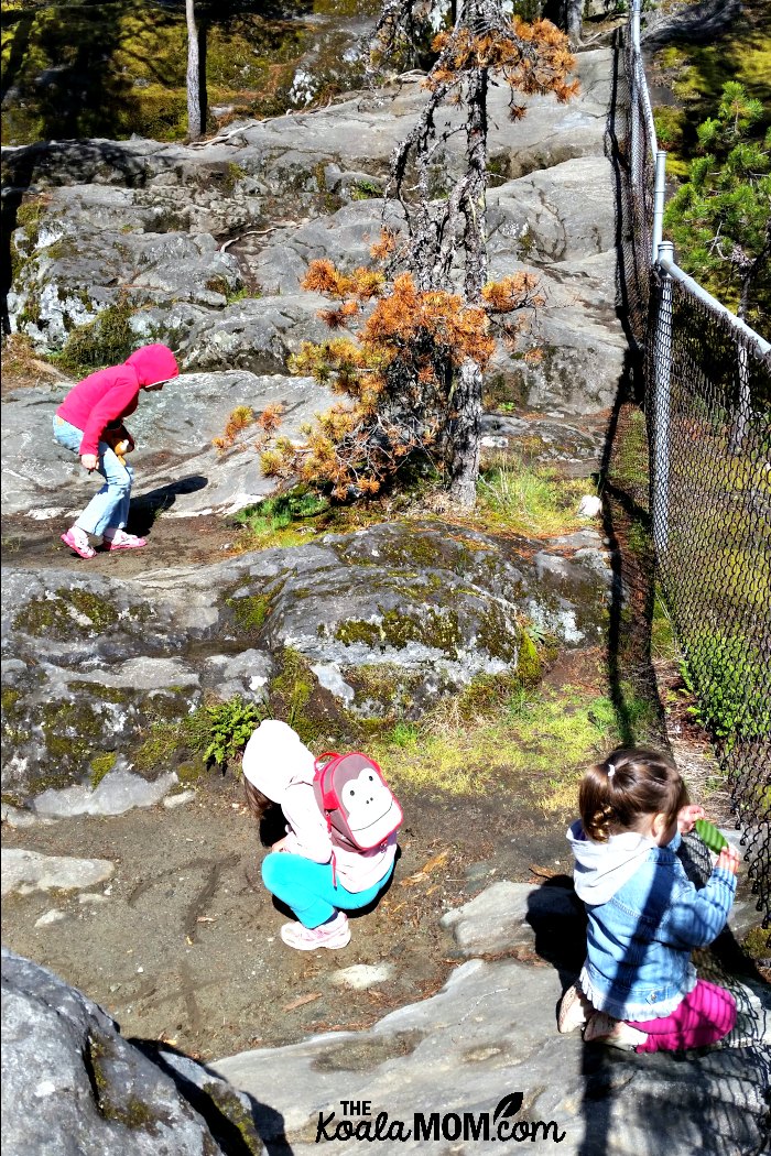 Three girls exploring at Nairn Falls.