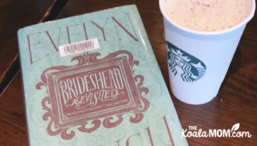 Brideshead Revisited by Evelen Waugh, on a table at Starbucks with a coffee nearby.