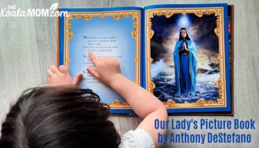 5-year-old Pearl reading Our Lady's Picture Book by Anthony DeStefano
