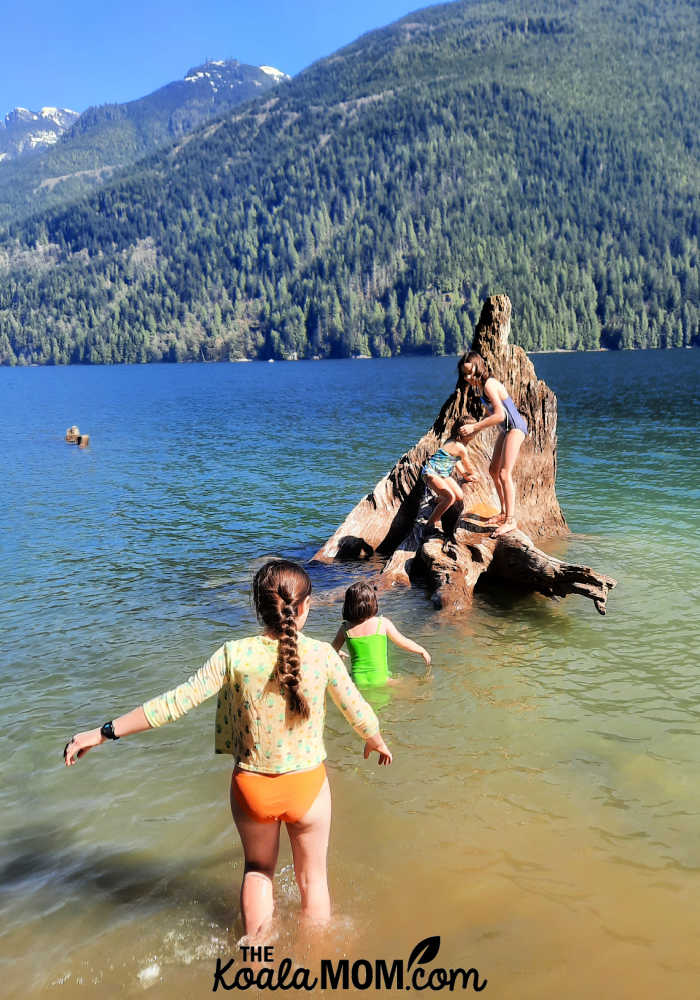 Four sisters swimming in Alouette Lake.