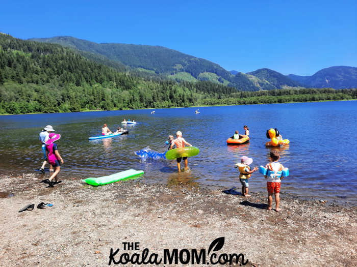 Kids swimming and playing at Deer Lake.