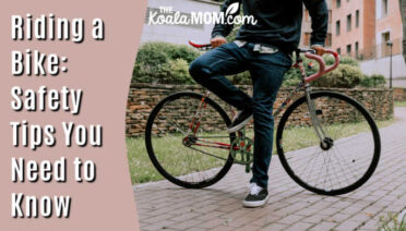Riding A Bike: Safety Tips You Need to Know. Photo of man standing by his bike by cottonbro studio on Pexels.