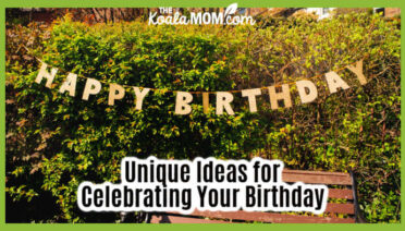 Unique Ideas for Celebrating Your Birthday. Photo of Happy Birthday banner over brown bench near a hedge by Eilis Garvey on Unsplash