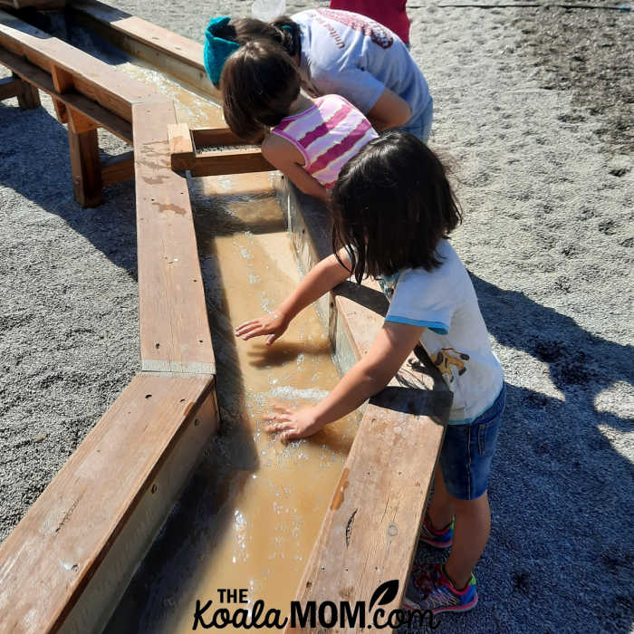 Girls panning for gold at the Paradice Mining Co.