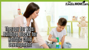 Therapy for Kids: Building Blocks for Holistic Child Development. Photo of female therapist watching a boy play with blocks via Depositphotos.