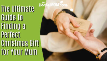 The Ultimate Guide to Finding a Perfect Christmas Gift for Your Mum. Photo of person handing a small gift box to a woman by Kateryna Hliznitsova on Unsplash