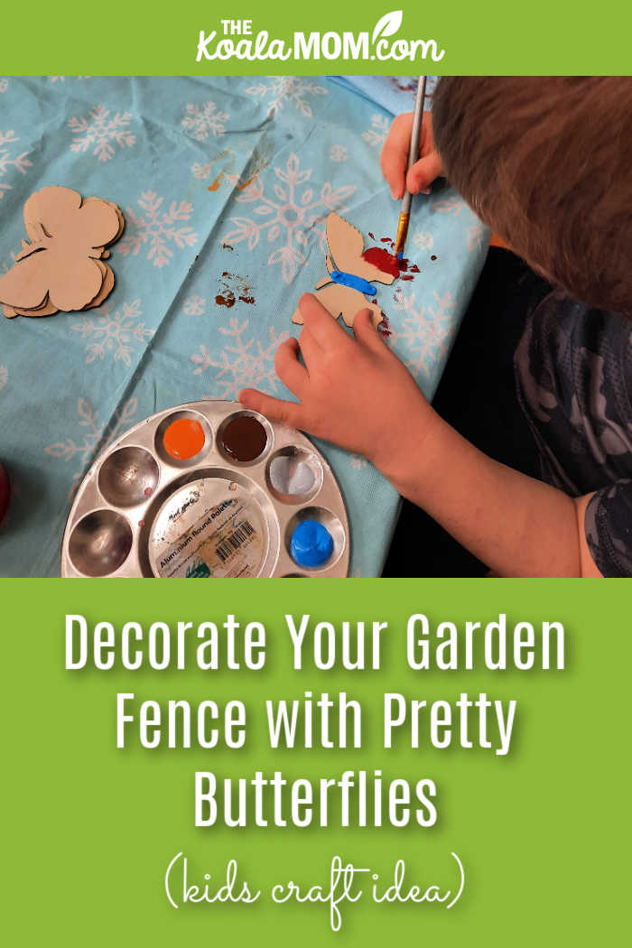 Decorate Your Garden Fence with Pretty Butterflies (kids craft idea). Photo of boy painting butterfly with a paint palette beside him.