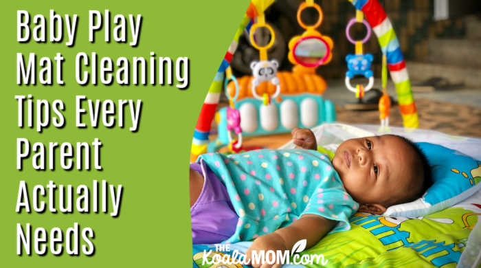 Baby Play Mat Cleaning Tips Every Parent Actually Needs. Photo of cute baby laying in a play mat with toys overhead by DICSON via Unsplash.
