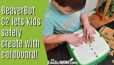 BeaverBot C2 lets kids safely create with cardboard! Photo of boy using his green BeaverBoty cutter by Bonnie Way.