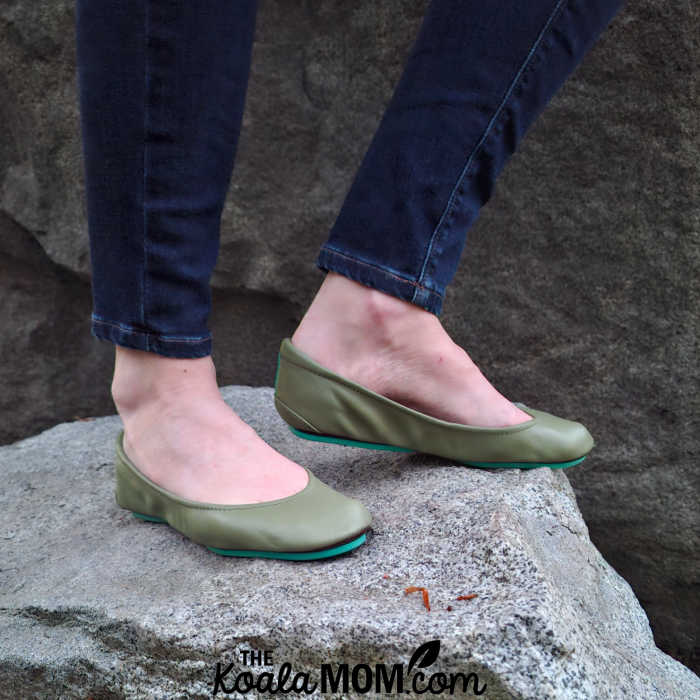 Photo of feet wearing green ballet flats on rock by Bonnie Way.