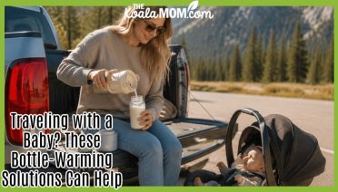 Traveling with a Baby? These Bottle-Warming Solutions Can Help. Provided stock photo of mom sitting on a truck tailgate in a scenic location, pouring milk from a thermos into a baby bottle, while baby in a car seat looks on.