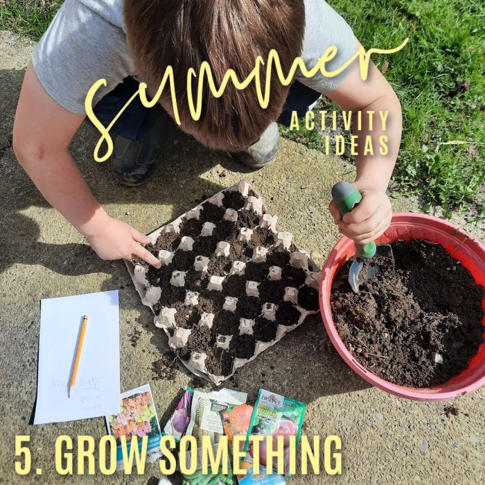 Summer activity ideas 5. Grow something. Photo of a little boy shoveling dirt into an egg carton by Bonnie Way.